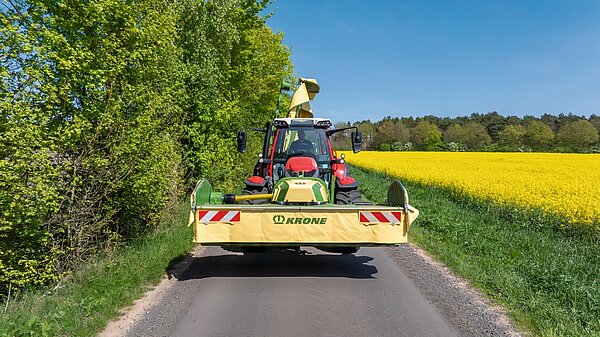 Опция: гидравлически складываемые боковые щитки